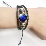 Pulsera de cuero con dijes de los 12 signos del zodiaco - Elegante regalo de cumpleaños